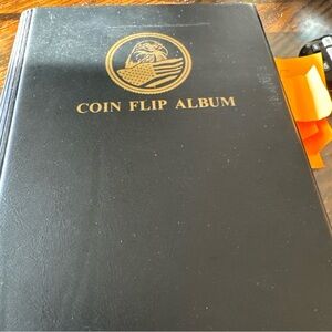 Black Coin Flip Album with Gold Emblem